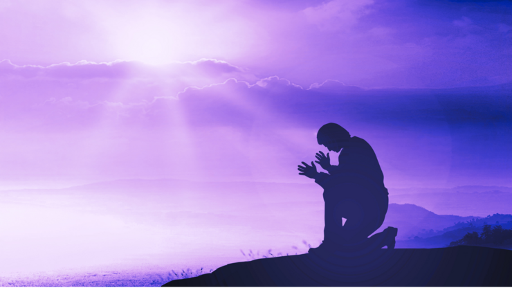 Prayer kneeling and praying to God on mountain autumn sunset background