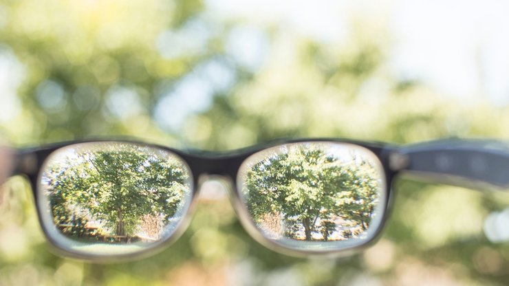 Looking thru strong prescription glasses outside.